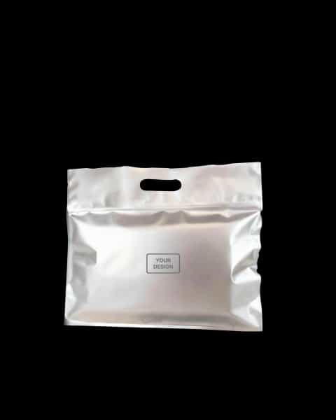 Bolsa metalizada con asa troquelada y cierre ziplock