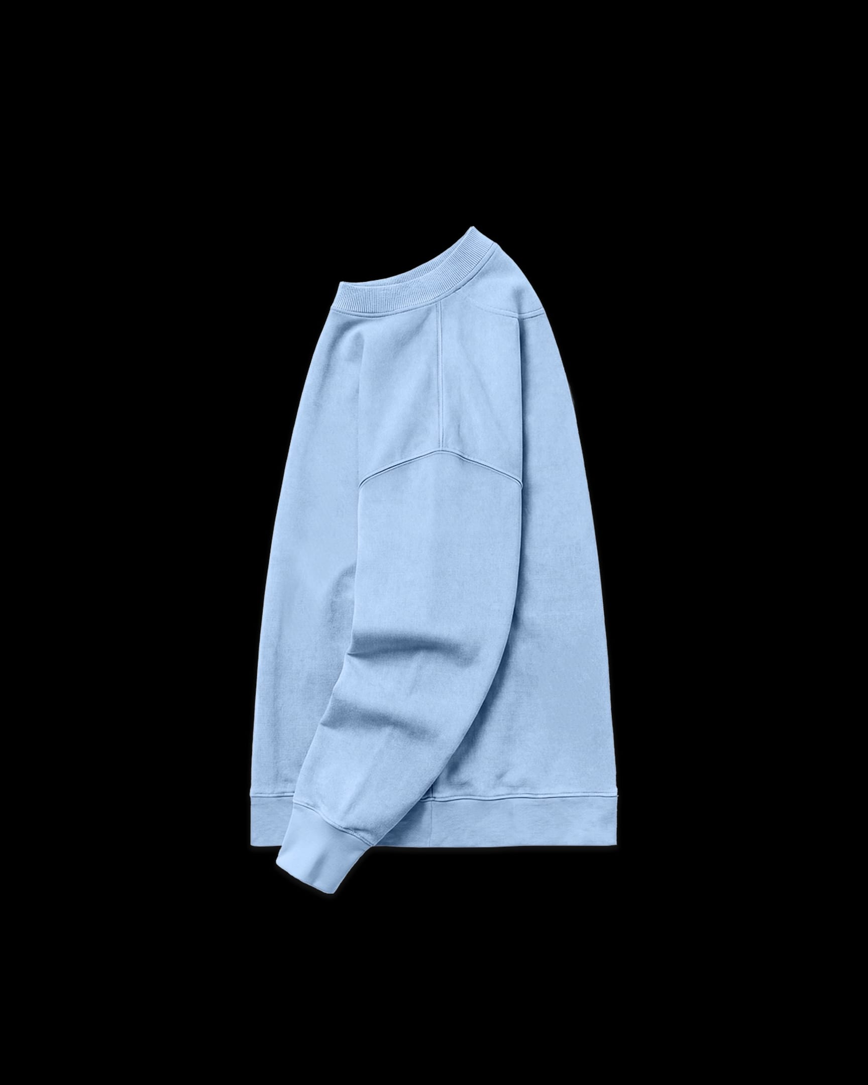 Lightweight Sweatshirt (Sky Blue) side view, with ribbed crew neck, shoulder seam detail, and ribbed cuffs.