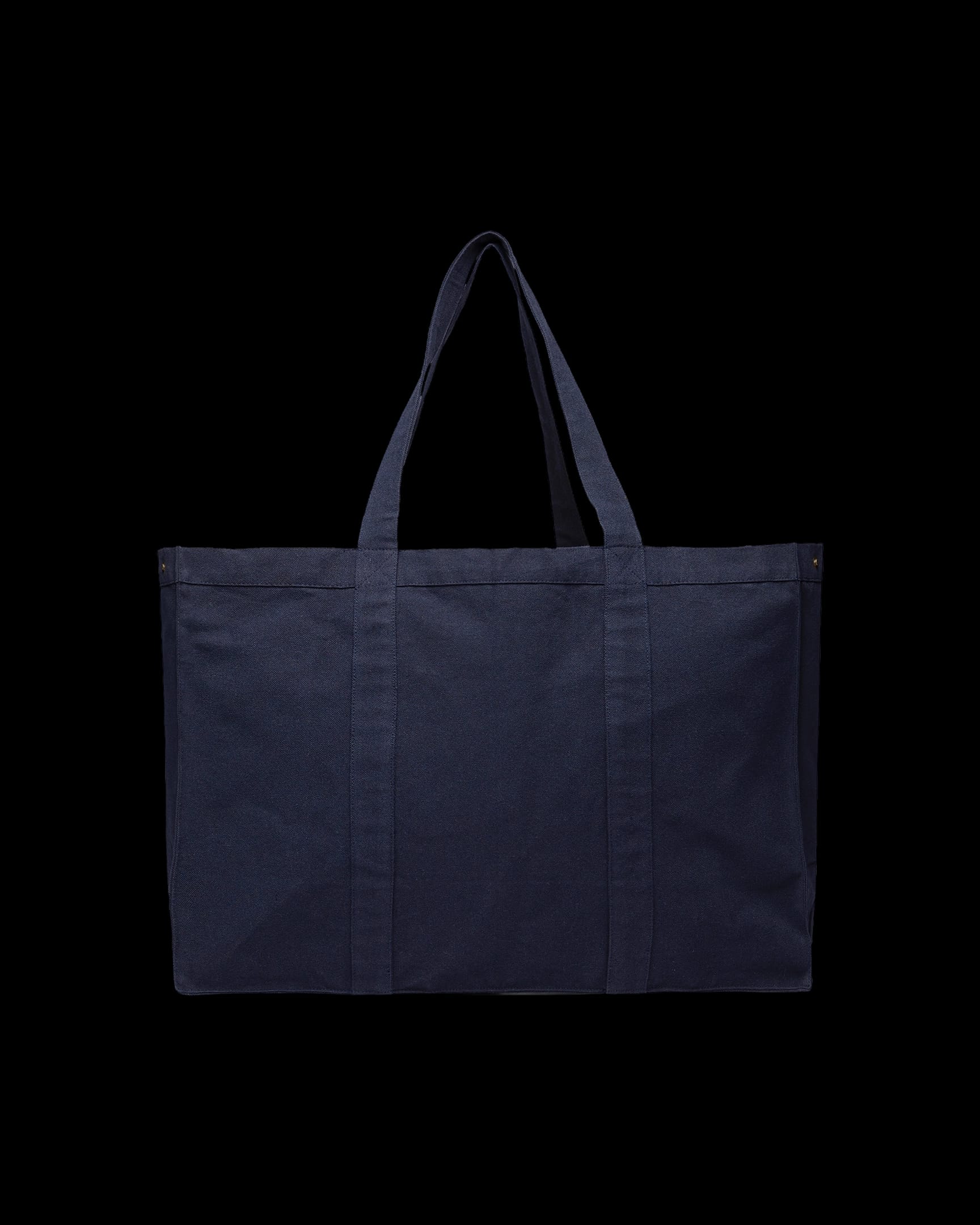Back view of the Maxi Tote Bag (Navy), a sturdy canvas tote with reinforced handles and visible stitching.